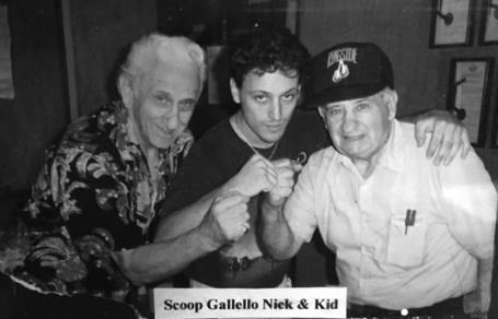 This is a photo of Nick Delury, the owner of Westchester Boxing Club along with his mentors